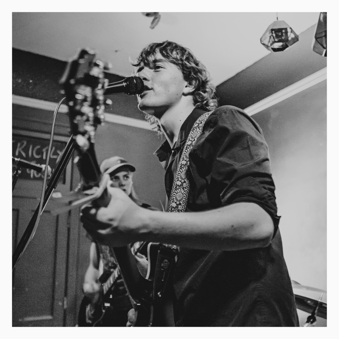 Xavier Lane - Lead Vocals & Guitar